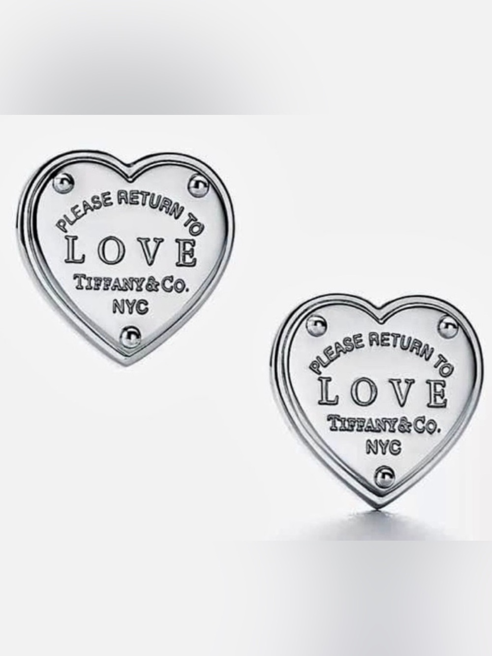 Tiffany & Co. Return to Tiffany love earrings in silver 925 .